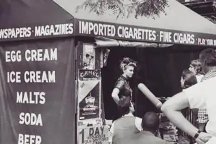 a man holding a sign