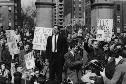 a group of people on a city street