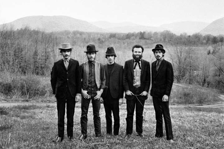 Garth Hudson et al. standing in a field posing for the camera