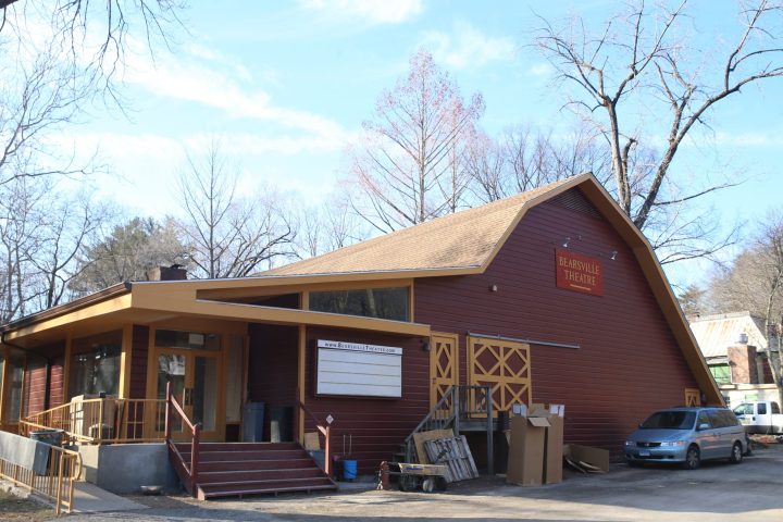 a house that is parked on the side of a building