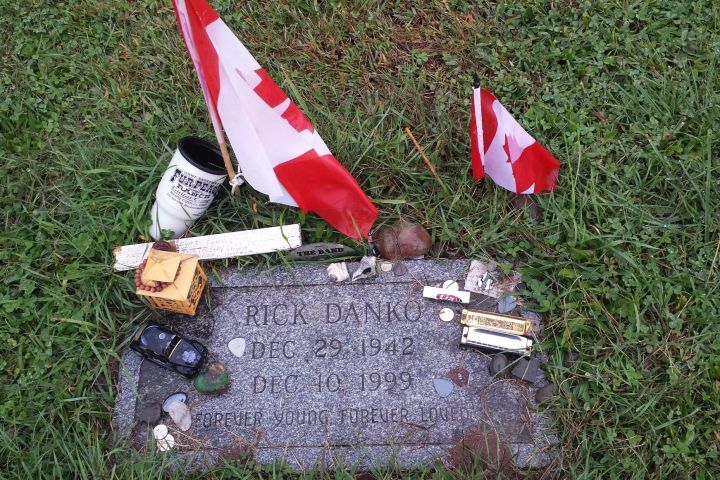 a bag sitting on top of a grass covered field